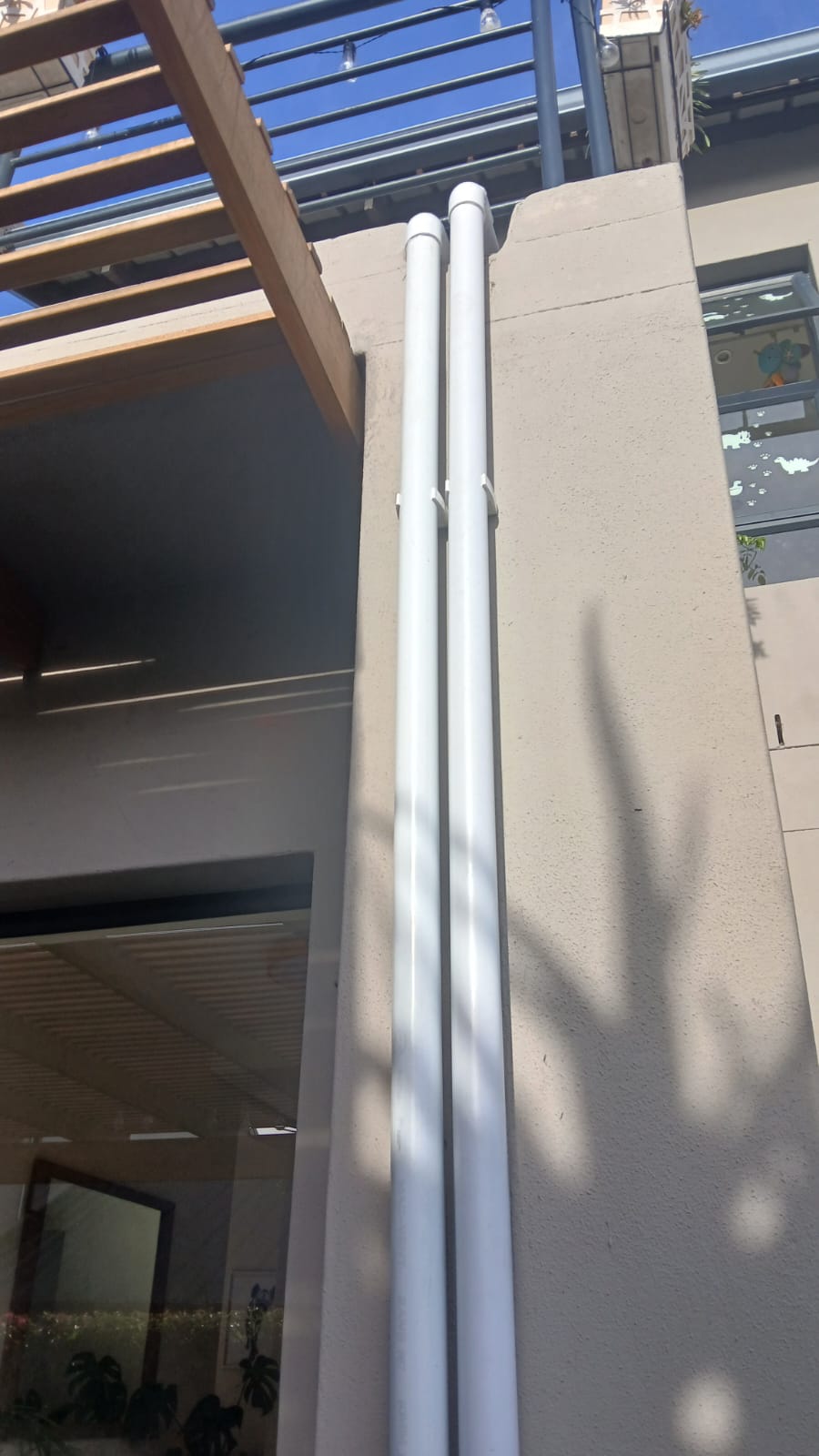 Solar heating pipe runs along an exterior wall
