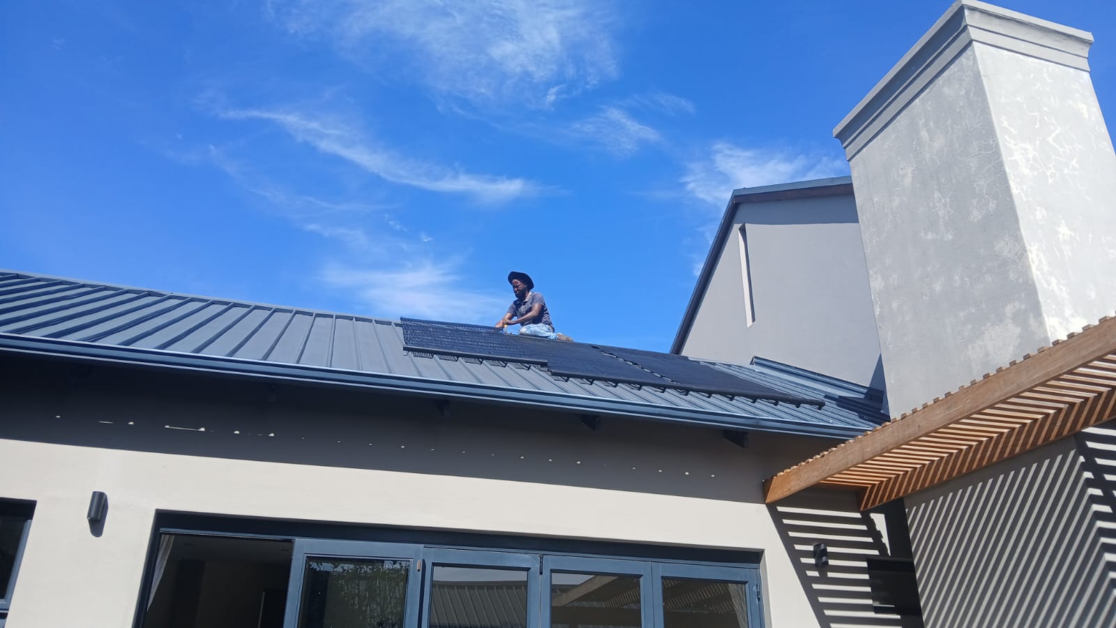 GridFree team installing solar pool panels